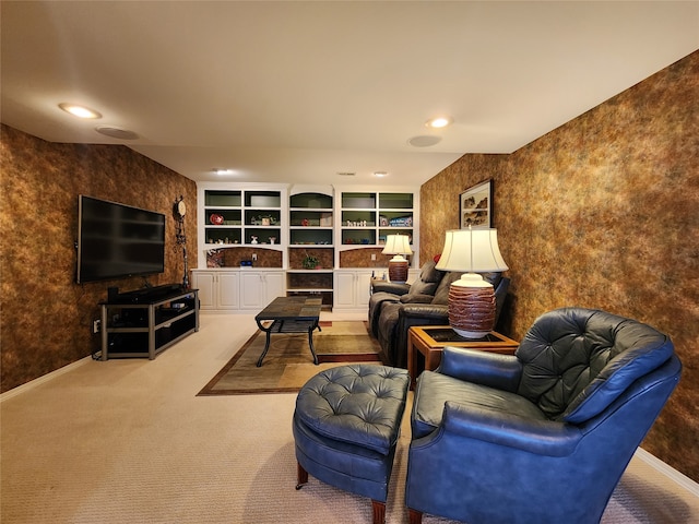 carpeted living room featuring built in features