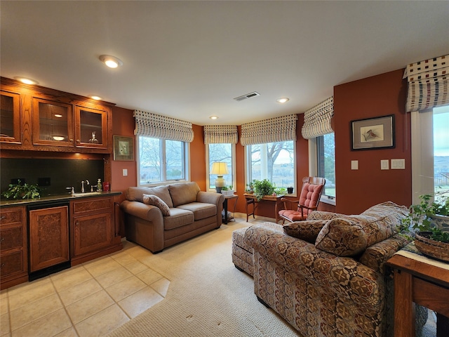 tiled living room with bar area