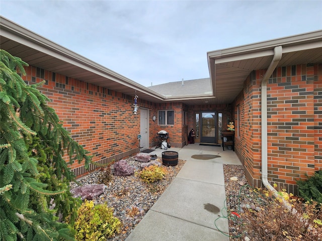 property entrance with a patio