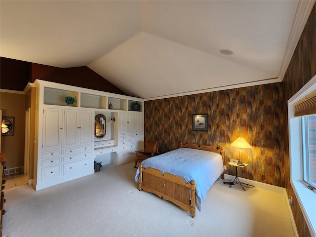 carpeted bedroom featuring lofted ceiling