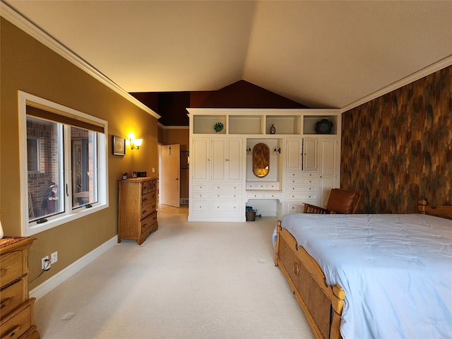 bedroom featuring light carpet, a closet, vaulted ceiling, and ornamental molding