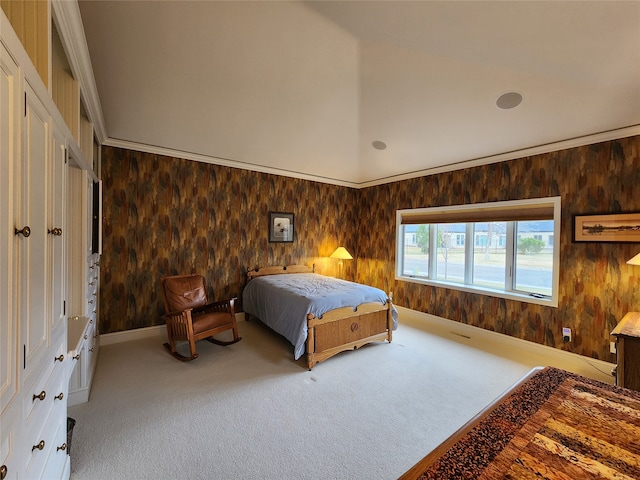 bedroom with carpet floors and crown molding