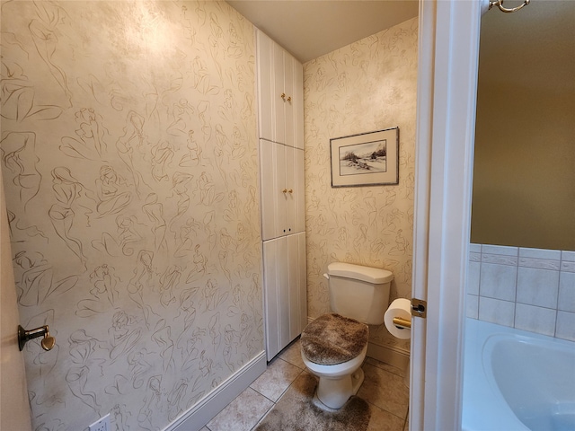 bathroom featuring tile patterned floors and toilet