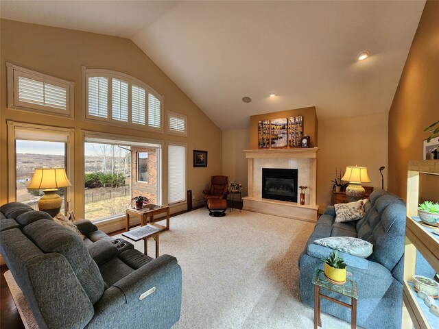 living room with carpet floors and lofted ceiling