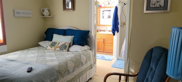 bedroom featuring light carpet