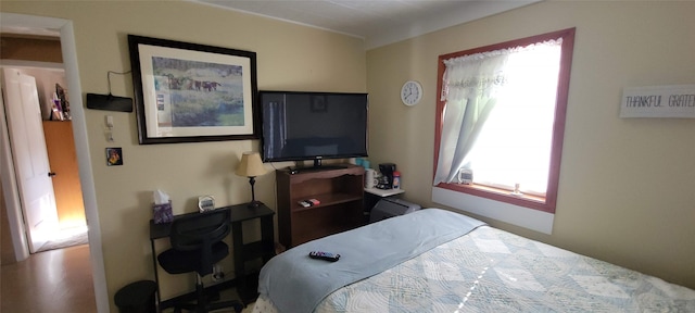 bedroom featuring hardwood / wood-style flooring