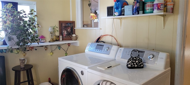 laundry room featuring washing machine and dryer