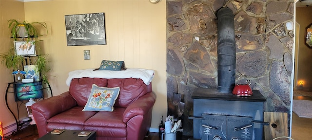 living room featuring a wood stove