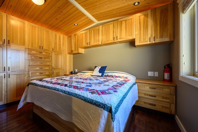 bedroom with lofted ceiling, dark wood-type flooring, and wooden ceiling