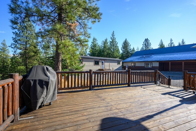 wooden terrace with grilling area