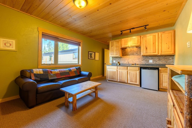 living room with rail lighting, crown molding, wood ceiling, and light carpet