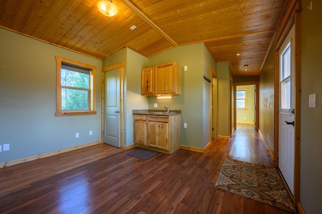 kitchen with light brown cabinetry, wood ceiling, vaulted ceiling, sink, and dark hardwood / wood-style floors