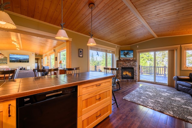 kitchen featuring tile counters, dishwasher, lofted ceiling with beams, dark hardwood / wood-style floors, and plenty of natural light