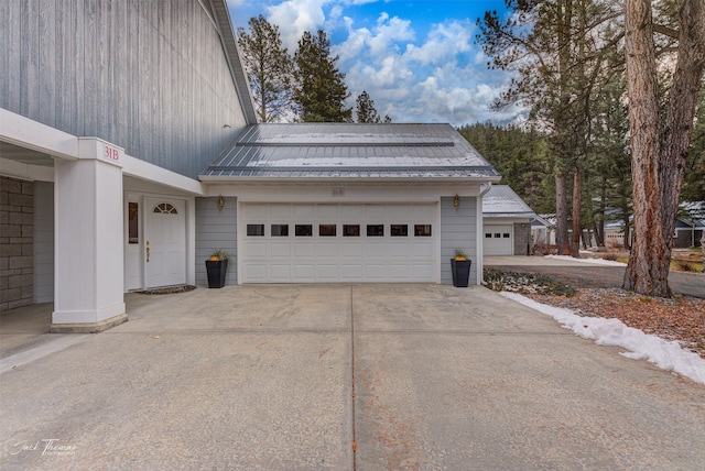 view of property exterior featuring a garage