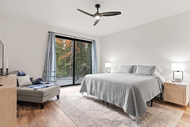 bedroom featuring ceiling fan, access to exterior, and light hardwood / wood-style flooring