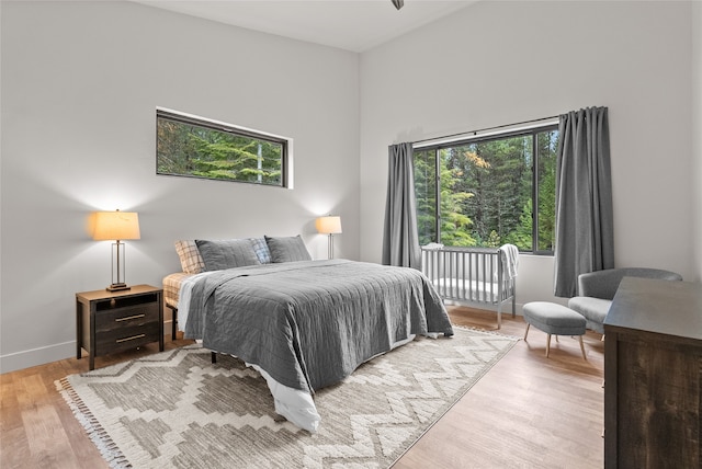 bedroom with light hardwood / wood-style flooring