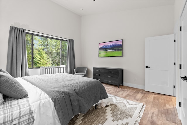 bedroom with light hardwood / wood-style floors