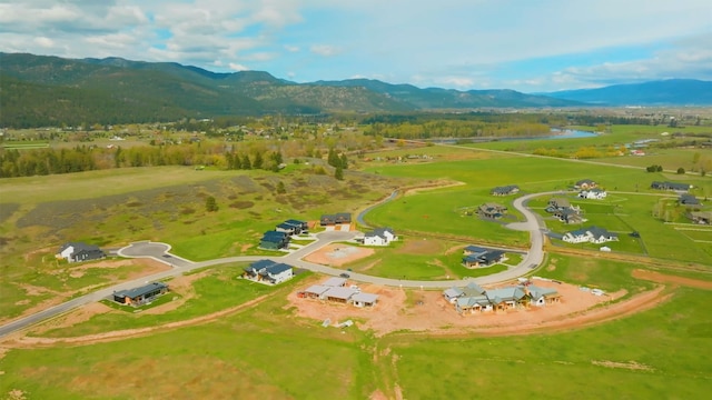 bird's eye view featuring a mountain view and a rural view