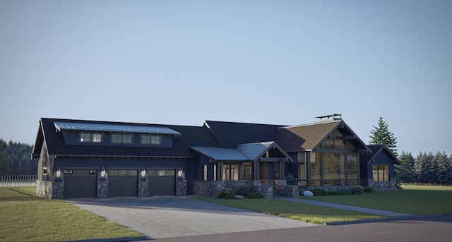 view of front of house featuring a front lawn and a garage