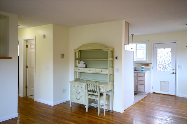 kitchen with hardwood / wood-style floors