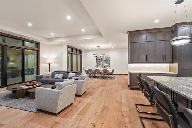 92 Woodlandstar Cir, Whitefish, MT 59937 - living area featuring baseboards, recessed lighting, and light wood-style flooring