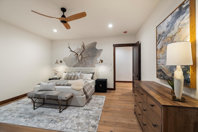 92 Woodlandstar Cir, Whitefish, MT 59937 - bedroom with baseboards, light wood-style floors, and recessed lighting