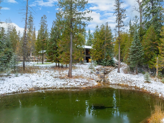 exterior space with a water view