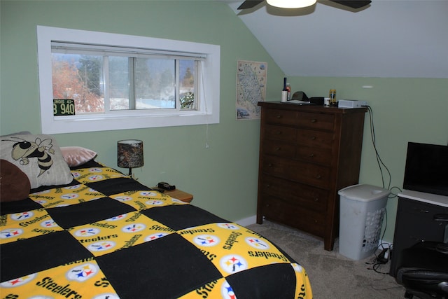 bedroom featuring ceiling fan, light colored carpet, and lofted ceiling