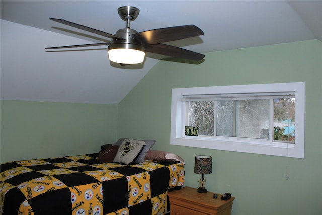 bedroom featuring vaulted ceiling and ceiling fan