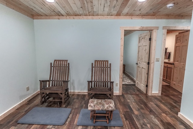 living area featuring wooden ceiling and dark wood-type flooring