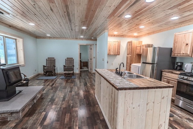 kitchen featuring wood ceiling, light brown cabinetry, sink, and stainless steel appliances