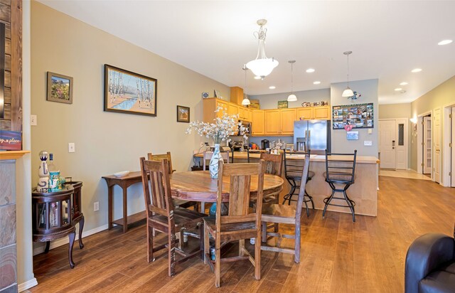 dining room with light wood-type flooring