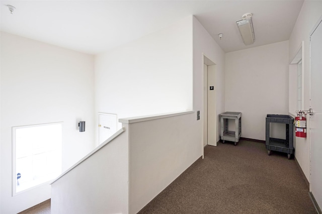 100 Rocky Point Rd Unit F5, Polson, MT 59860 - hall featuring carpet and an upstairs landing
