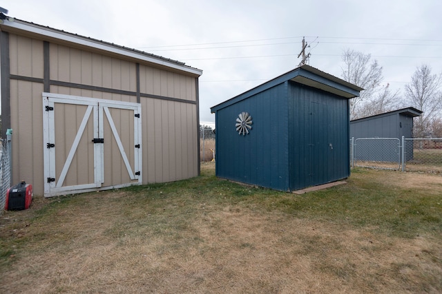 view of outbuilding with a yard