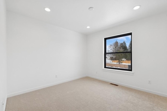 view of carpeted spare room