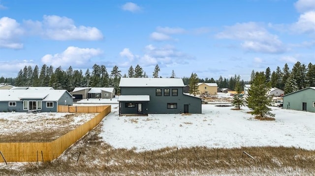 view of snow covered house