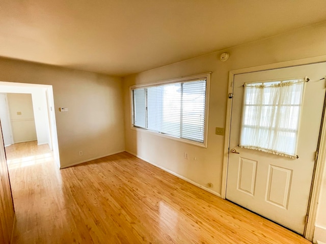 doorway to outside featuring light hardwood / wood-style flooring