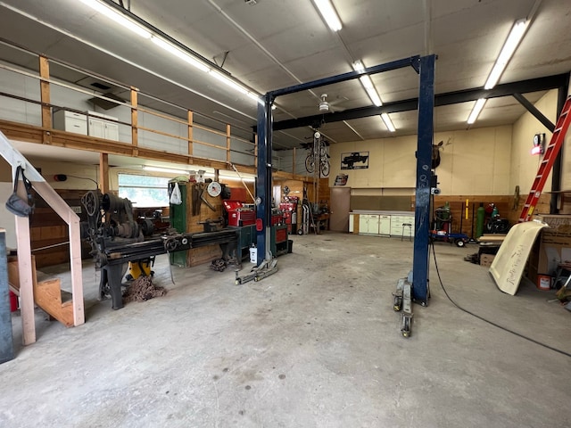 garage with a workshop area