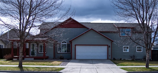 4019 Lancaster Rd, Missoula, MT 59808 - traditional home featuring a garage, driveway, and roof with shingles