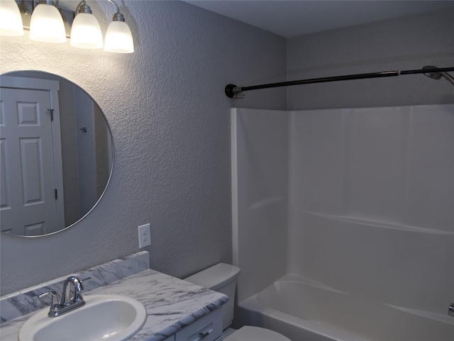 4019 Lancaster Rd, Missoula, MT 59808 - full bathroom featuring a textured wall, shower / bath combination, and vanity