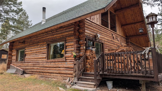 view of home's exterior featuring a deck