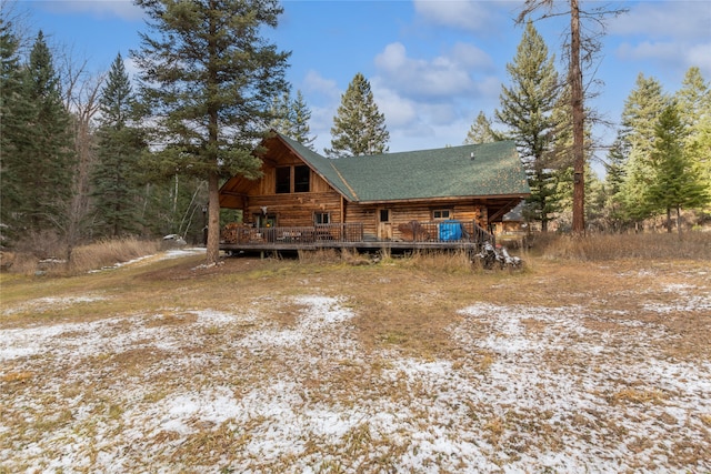 view of front of property with a wooden deck