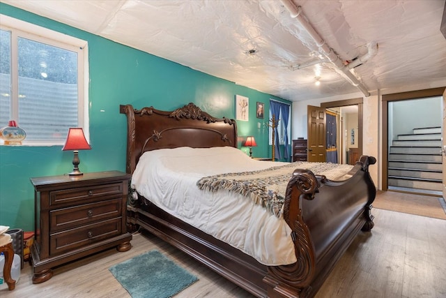 bedroom featuring light hardwood / wood-style flooring