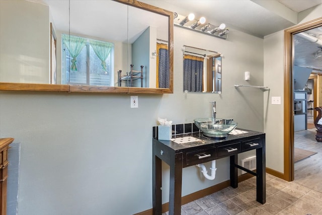 bathroom featuring hardwood / wood-style flooring and sink