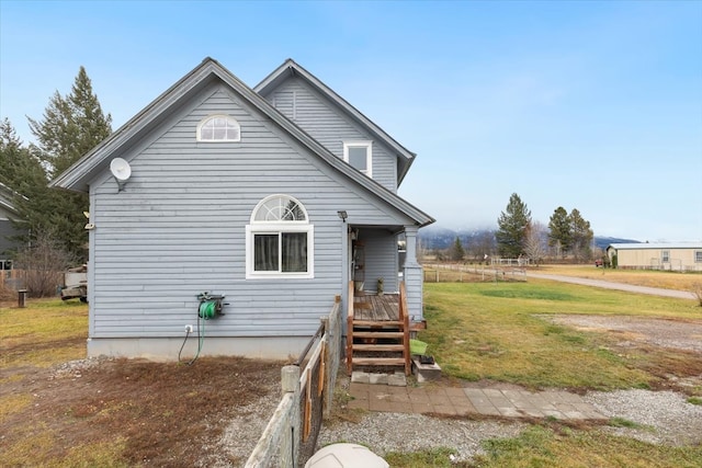 view of front of property with a front lawn