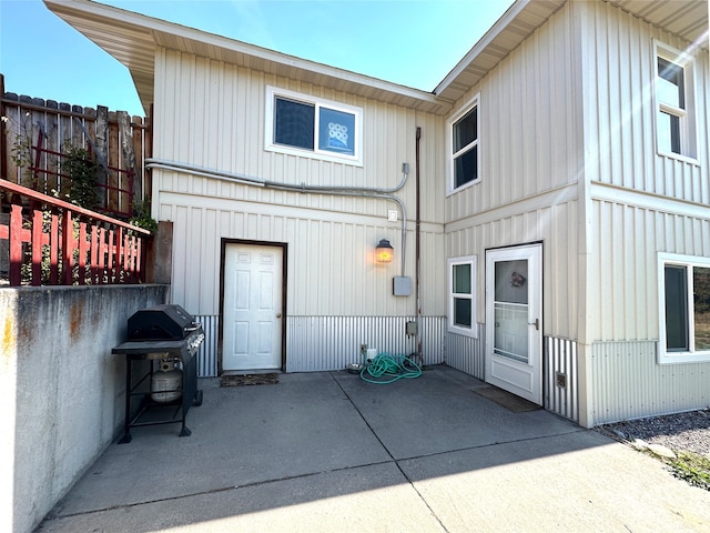 back of property featuring a patio area