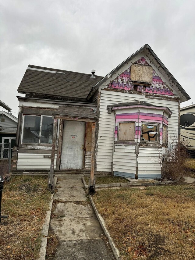 703 Birch St, Anaconda, MT 59711 - victorian house with roof with shingles