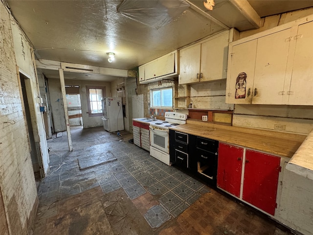 kitchen featuring wooden counters and white appliances