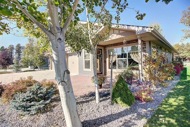 126 Moes Run, Kalispell, MT 59901 - view of front facade featuring driveway