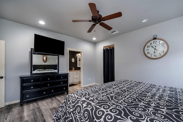 126 Moes Run, Kalispell, MT 59901 - bedroom with visible vents, wood finished floors, baseboards, recessed lighting, and a ceiling fan